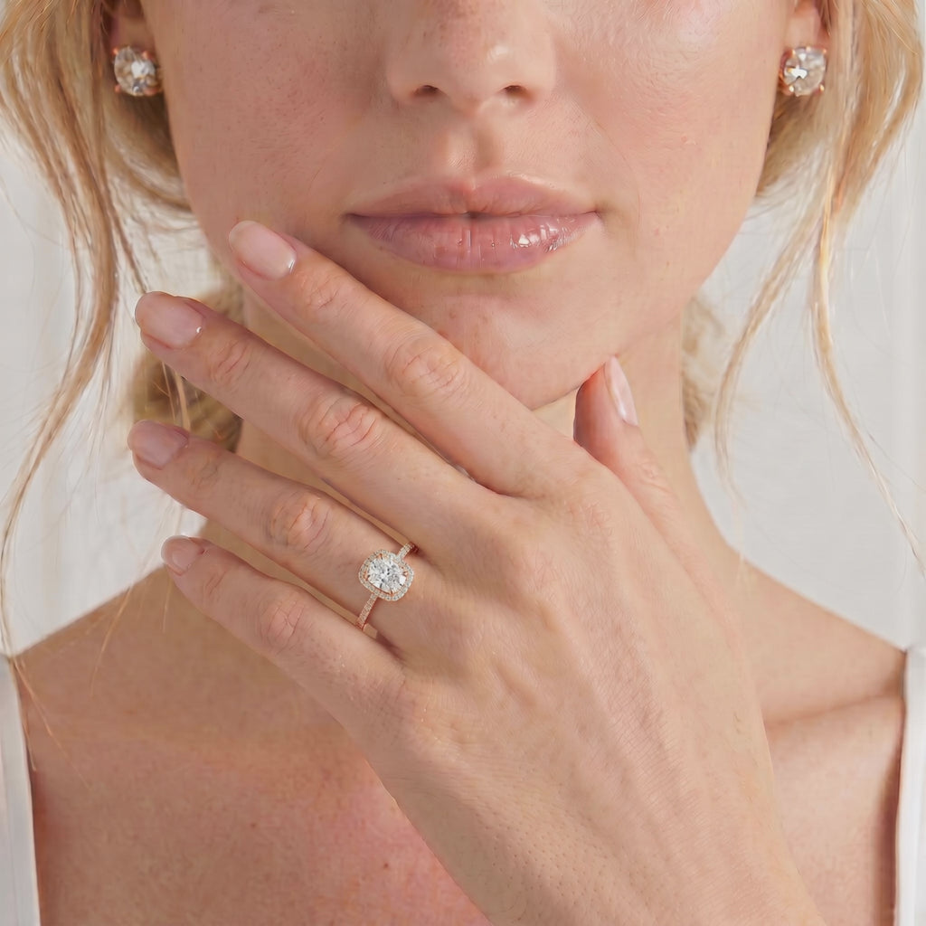 Video of the Darley elongated cushion lab-grown diamond halo engagement ring in 18k rose gold worn on a hand.