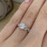 FLEUR - Round Natural Diamond 950 Platinum Shoulder Set Ring