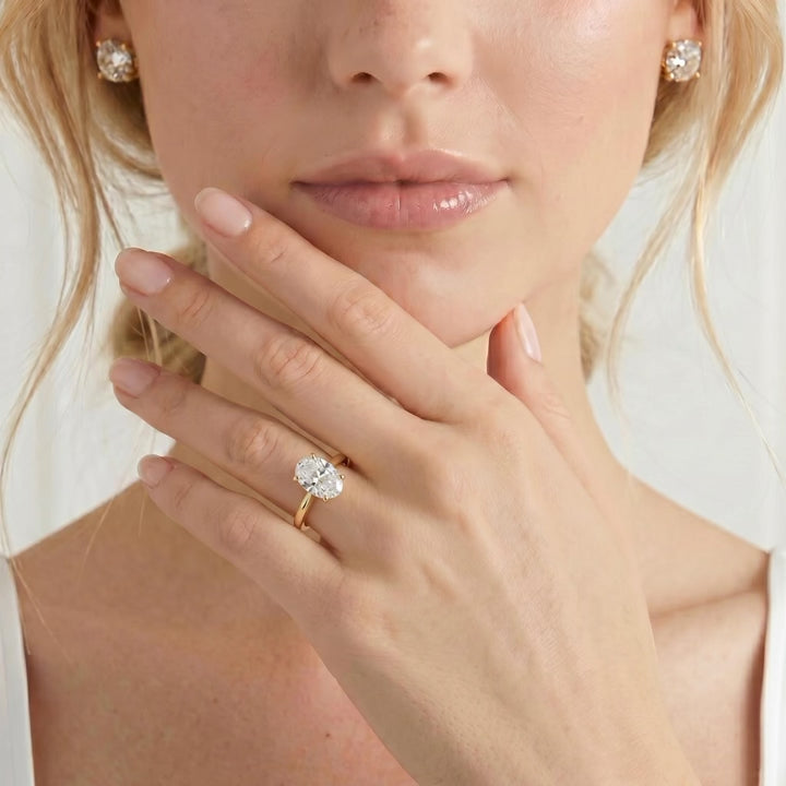 Isabella solitaire oval lab diamond cathedral setting set 18k yellow gold engagement ring