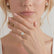 Video of the Darley elongated cushion lab-grown diamond halo engagement ring in 18k yellow gold worn on a hand.