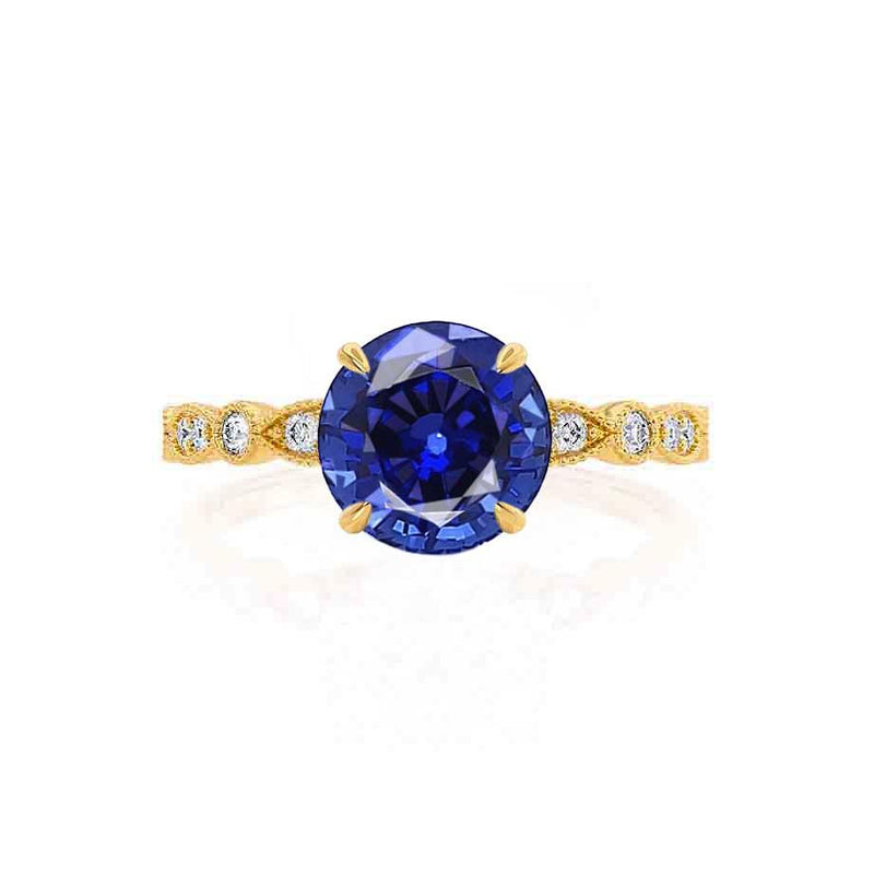 Hope yellow gold marquise shoulder set milgrain detail Chatham round blue sapphire diamond engagement ring Lily Arkwright 