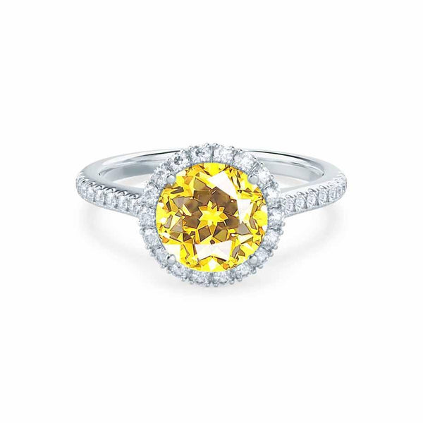 Lavender round cut yellow sapphire lab diamond halo engagement ring 18k white gold shoulder set by Lily Arkwright 