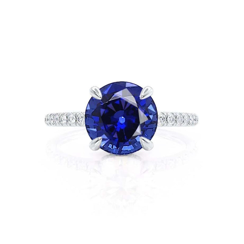 Lively white gold shoulder set Chatham round blue sapphire diamond engagement ring Lily Arkwright 