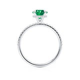 Lively brilliant round cut emerald and diamond engagement ring platinum shoulder set Lily Arkwright 