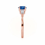 Lovetta round cut chatham blue sapphire lab diamond engagement ring 18k rose gold classic trilogy Lily Arkwright