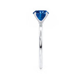 Lulu round cut Medium Blue Sapphire and diamond engagement ring white gold solitaire Lily Arkwright 