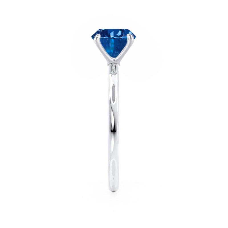 Lulu round cut Medium Blue Sapphire and diamond engagement ring platinum solitaire Lily Arkwright 