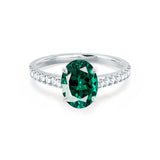 Viola oval cut emerald lab diamond engagement ring 950 platinum shoulder set ring by Lily Arkwright
