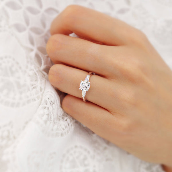 LOVETTA - Round Moissanite & Diamond Baguette 18k White Gold Trilogy Engagement Ring Lily Arkwright